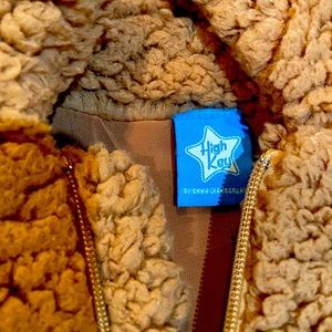 emma chamberlain poopy coat